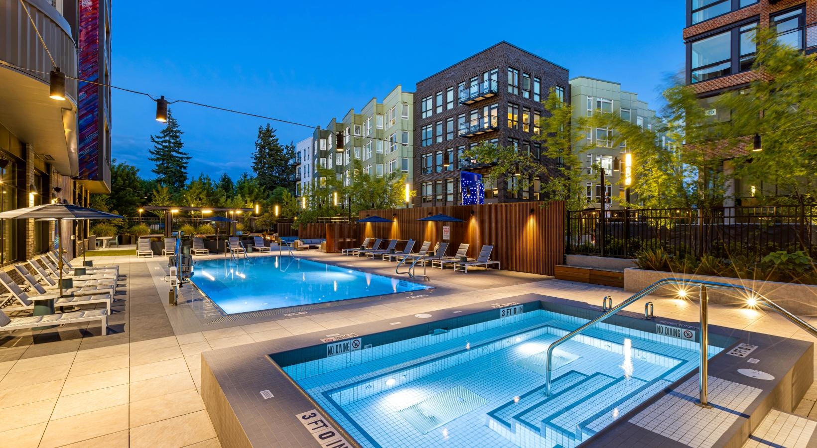 Relax and unwind poolside a swimming pool in a city