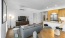 a living room with a couch and a tv