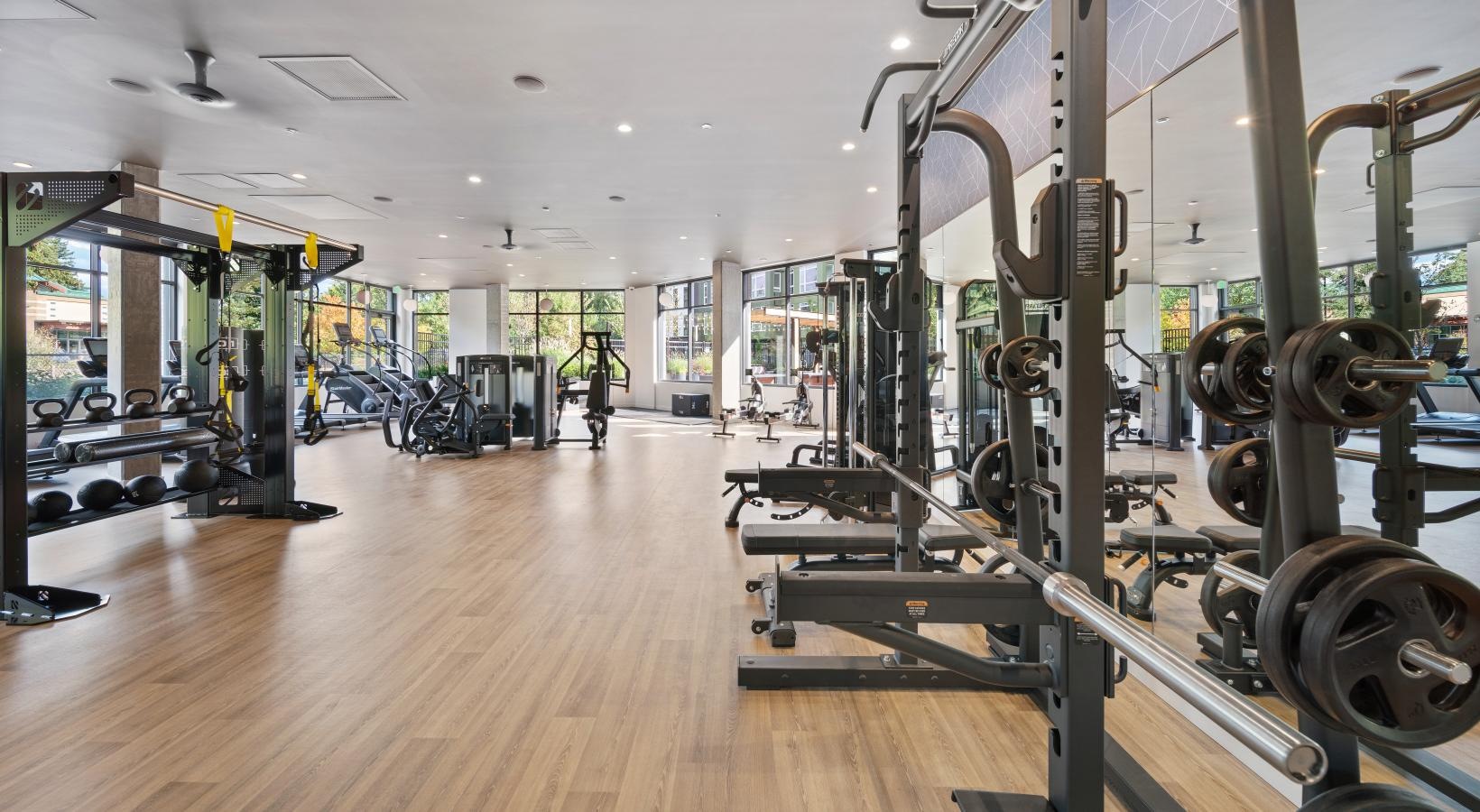 State-of-the-art amenities a gym with exercise equipment