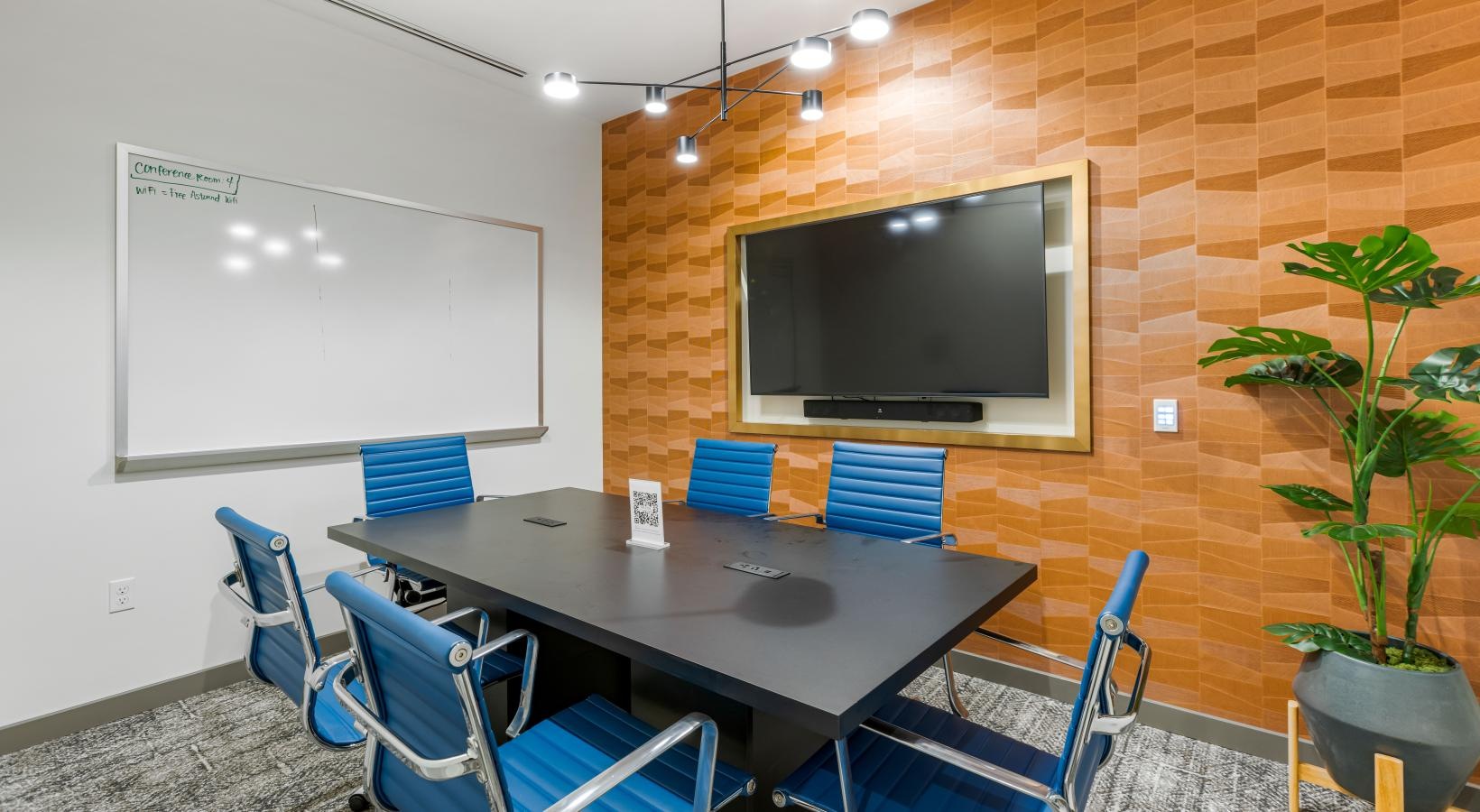 Access to resident-only features a room with a table and chairs