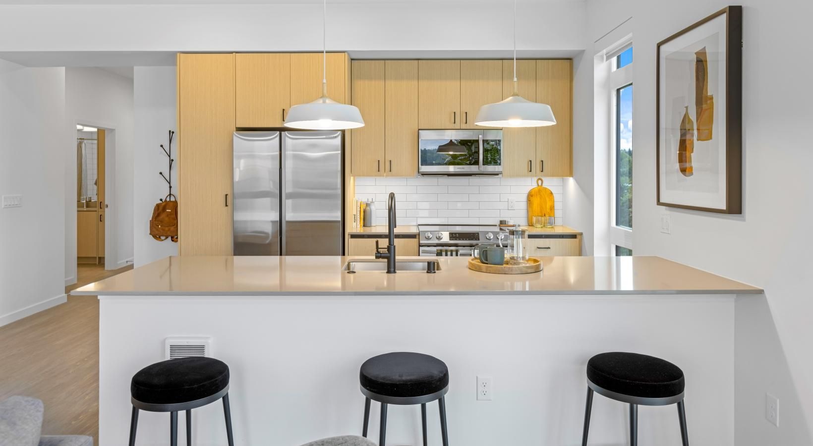 Relax and unwind in stylish living spaces a kitchen with a bar stools