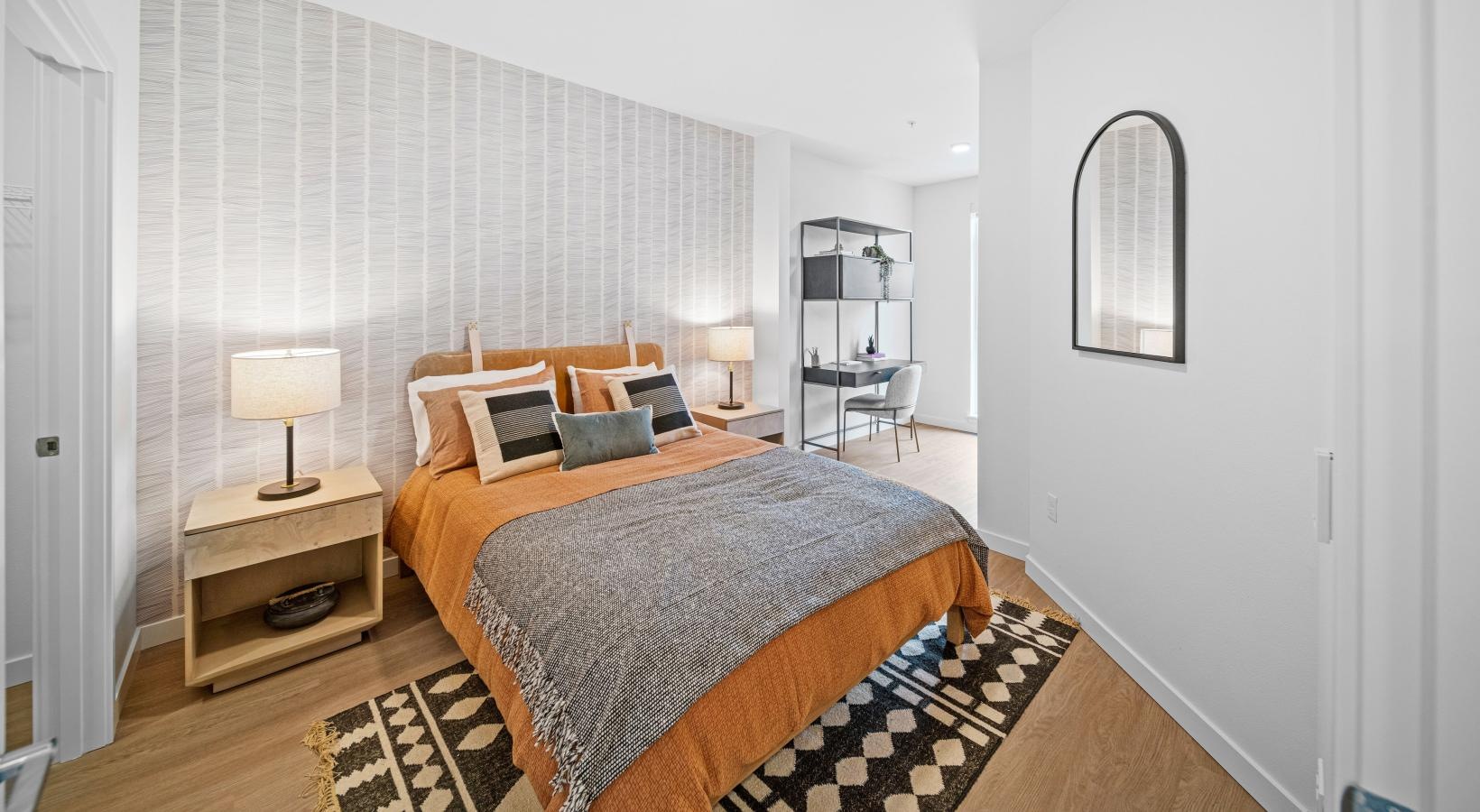 Sleep in style a bedroom with a bed and a mirror