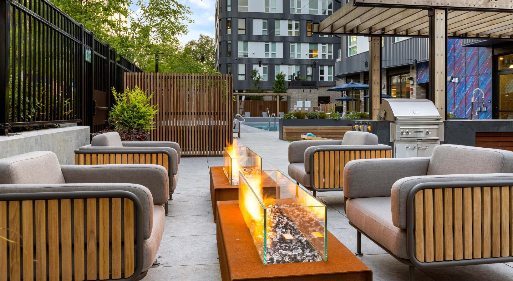 Enjoy our resident-only features a patio with chairs and a fire pit
