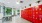 a room with red cabinets and a table